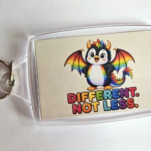 Different. Not Less. – Rainbow Dragon Penguin Keyring